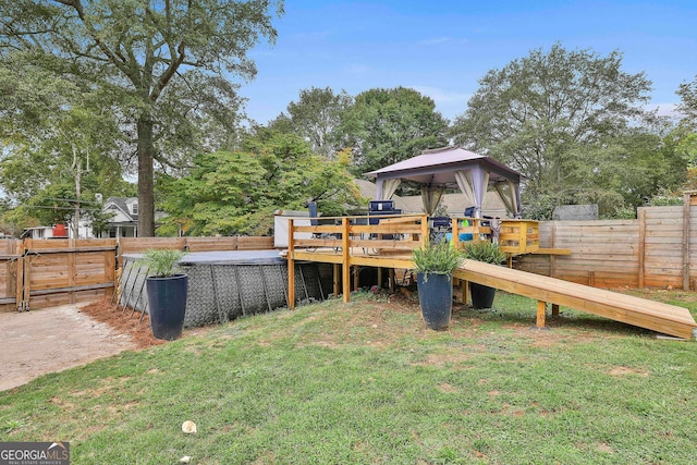 view of yard with a deck