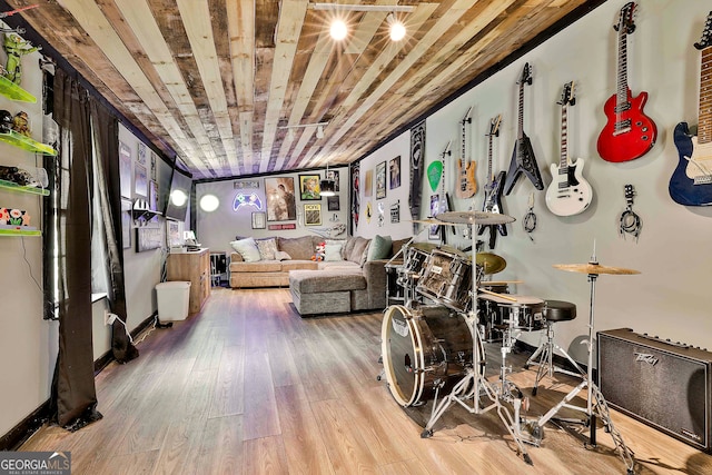 interior space with wood ceiling and hardwood / wood-style flooring