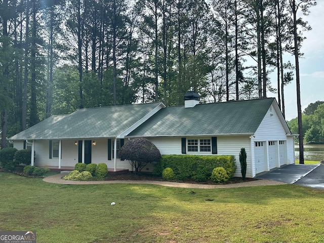 1011 Sugar Hill Way, Buckhead, GA 30625 - ranch-style home with a front yard, a chimney, covered porch, and asphalt driveway