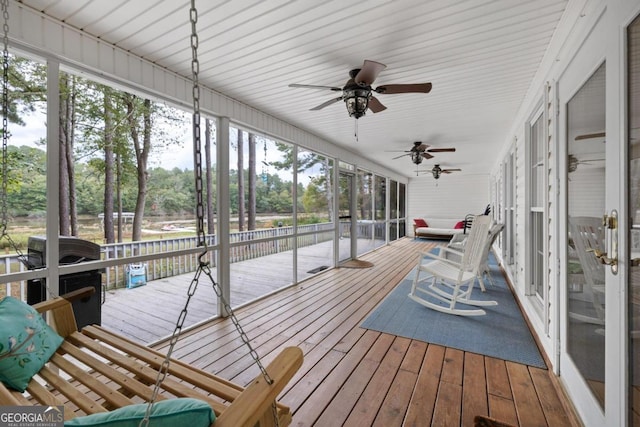 1011 Sugar Hill Way, Buckhead, GA 30625 - sunroom featuring a ceiling fan, view of wooded area, and plenty of natural light