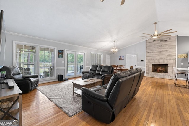 1011 Sugar Hill Way, Buckhead, GA 30625 - living room featuring a ceiling fan, hardwood / wood-style floors, a chandelier, a fireplace, and ornamental molding