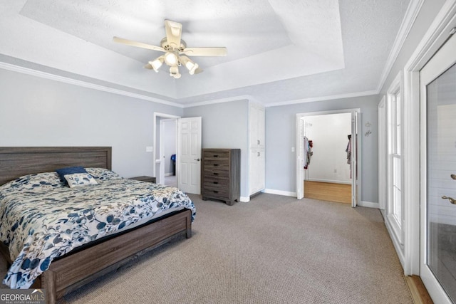 1011 Sugar Hill Way, Buckhead, GA 30625 - carpeted bedroom with crown molding, a ceiling fan, baseboards, and a closet