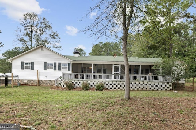1011 Sugar Hill Way, Buckhead, GA 30625 - rear view of property featuring a lawn, a chimney, a sunroom, and ceiling fan