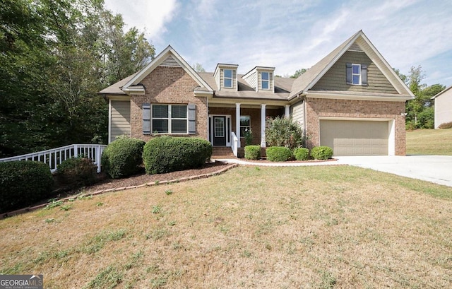 craftsman-style home featuring a garage, a porch, and a front lawn