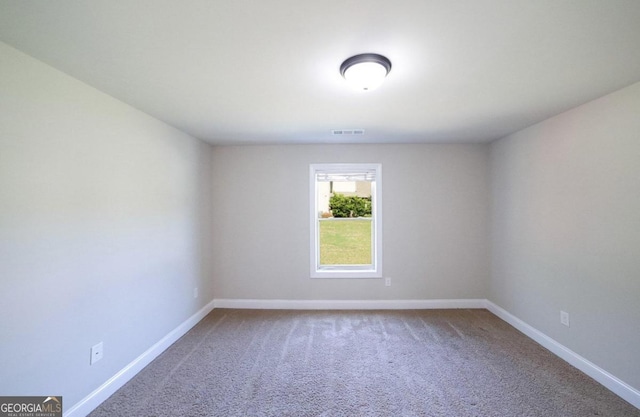 view of carpeted spare room