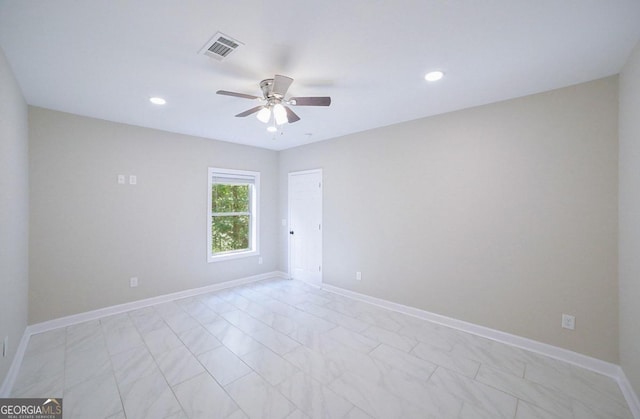 empty room featuring ceiling fan