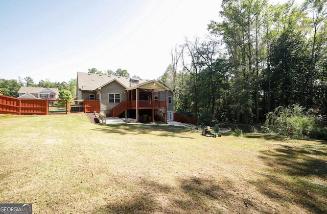 view of yard with a wooden deck