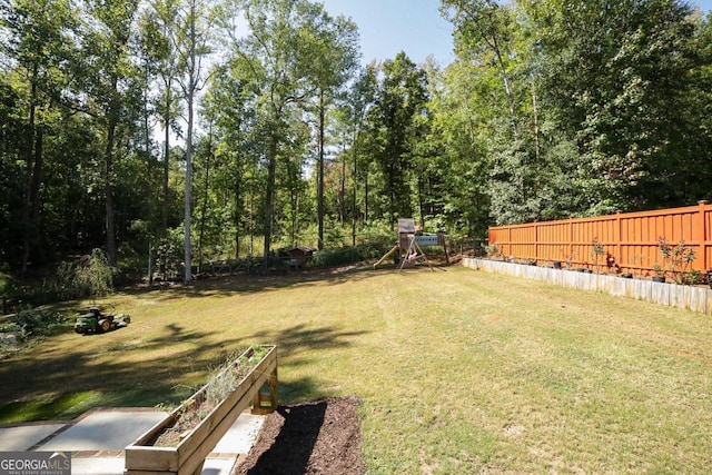 view of yard with a playground