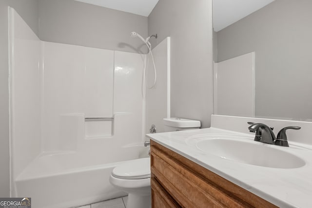 full bathroom with tile patterned flooring, shower / bath combination, vanity, and toilet