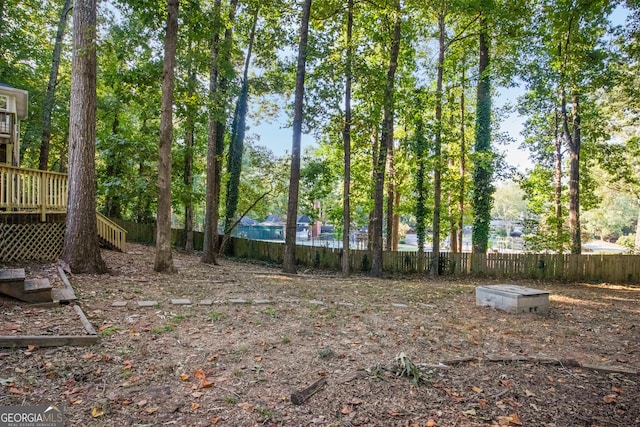 view of yard with a deck