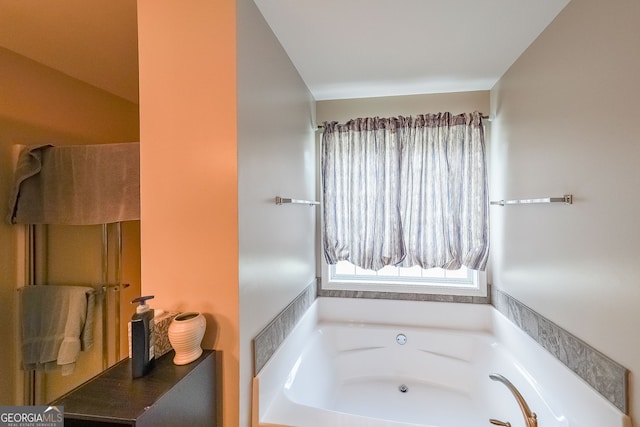 bathroom with a tub to relax in