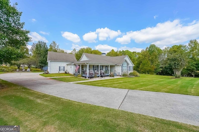 ranch-style house with a front lawn and covered porch