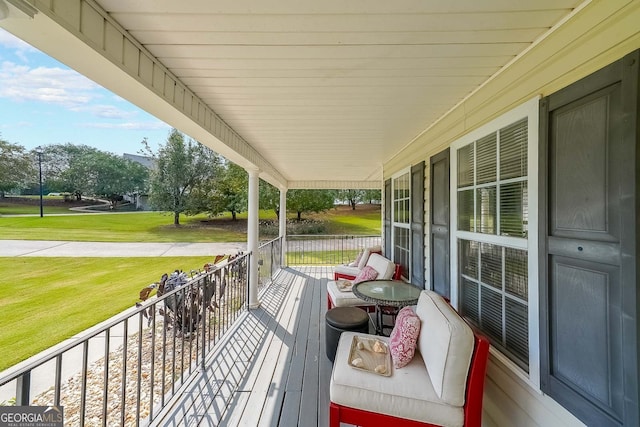 deck featuring a yard