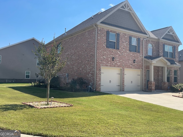 view of front facade with a garage and a front lawn