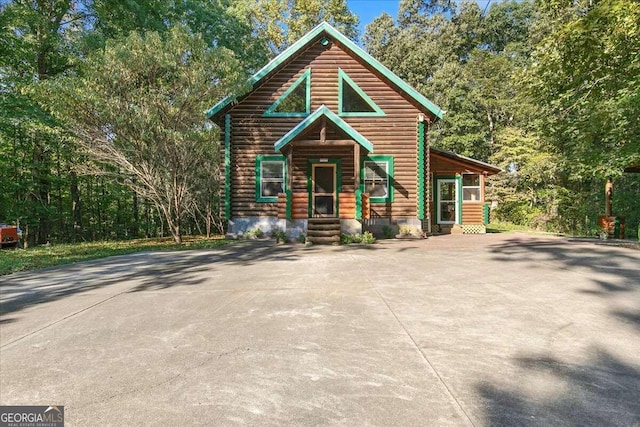 view of log cabin