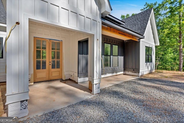 107 Marks Way, Canton, GA 30115 - doorway to property with board and batten siding and a shingled roof