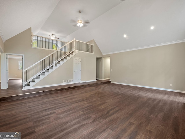 unfurnished living room featuring ceiling fan, dark hardwood / wood-style flooring, crown molding, and high vaulted ceiling