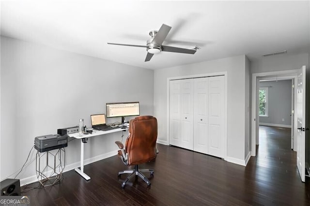 office area with dark hardwood / wood-style flooring and ceiling fan