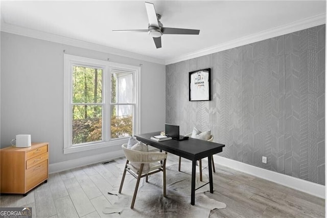 home office with crown molding, hardwood / wood-style floors, and ceiling fan