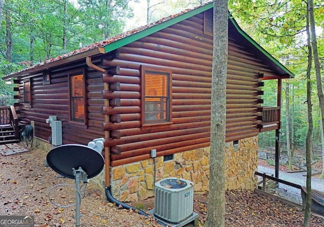 view of property exterior with cooling unit