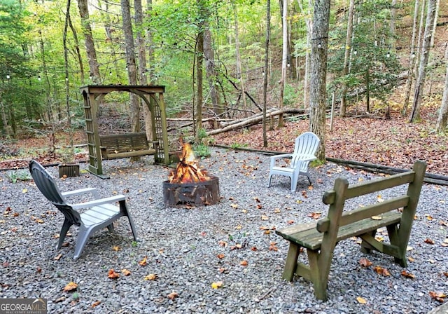 view of patio / terrace featuring a fire pit