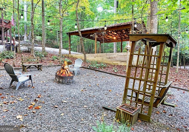 view of patio / terrace with a fire pit