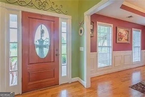 foyer with light hardwood / wood-style flooring