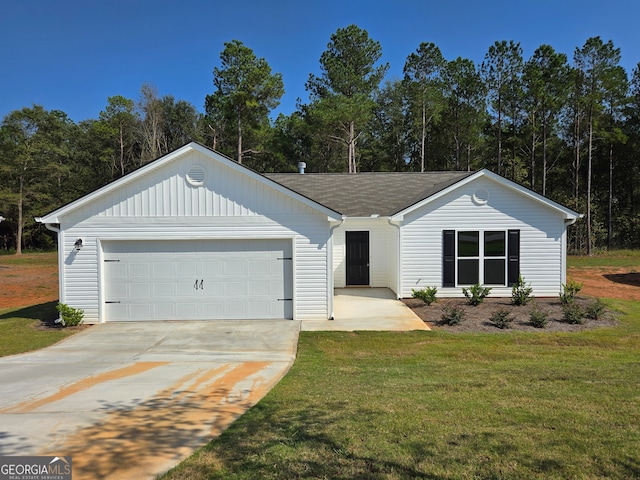 ranch-style house with a garage and a front yard