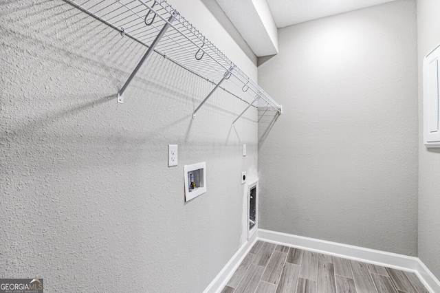 laundry room featuring hookup for a washing machine and hookup for an electric dryer