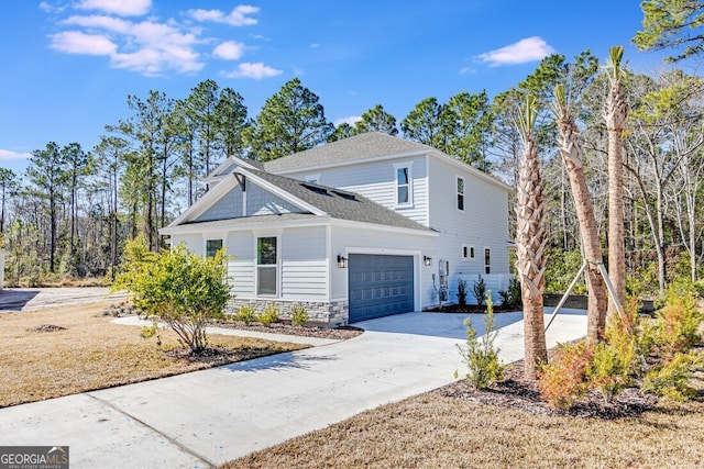 view of front of home with a garage