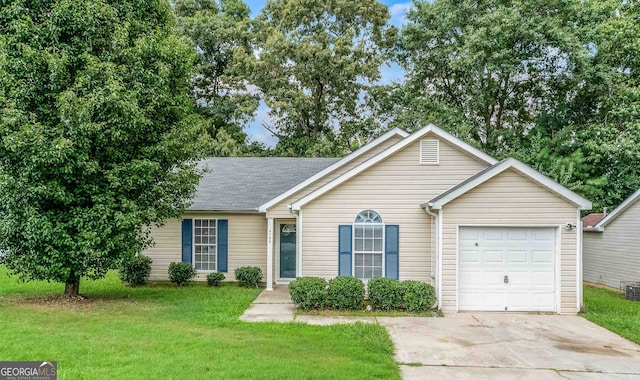 ranch-style house with a garage and a front yard