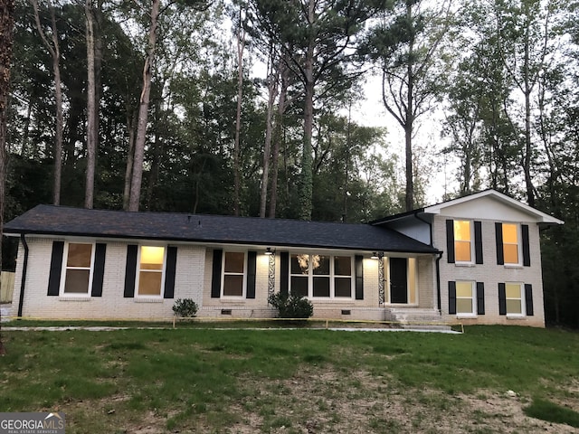 4330 Cedar Valley Ln, Conley, GA 30288 - tri-level home featuring crawl space, brick siding, and a front yard