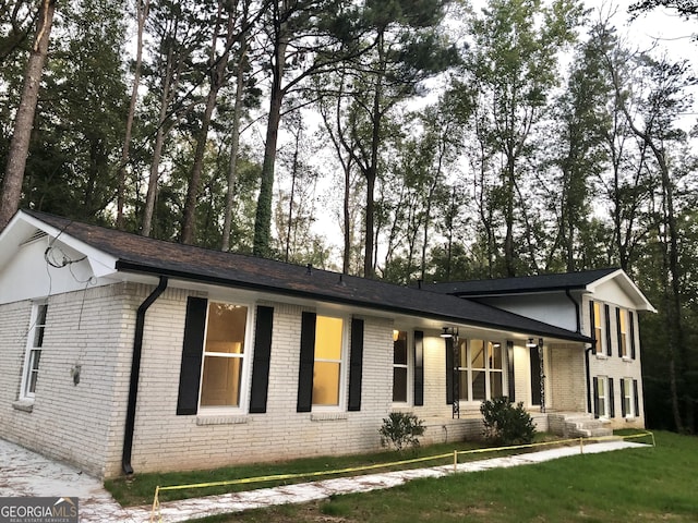 4330 Cedar Valley Ln, Conley, GA 30288 - view of front of home featuring brick siding and a front lawn