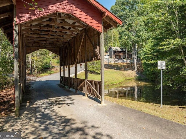 surrounding community with a water view