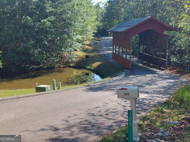 view of road with a water view