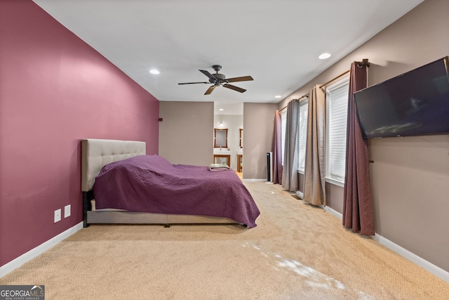 bedroom with light colored carpet and ceiling fan