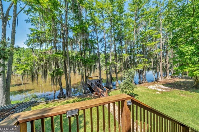 123 E Entreken Rd, Cobb, GA 31735 - unfurnished sunroom with hardwood / wood-style floors, visible vents, and wood walls