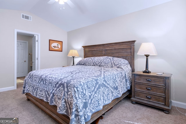 carpeted bedroom featuring ceiling fan and vaulted ceiling