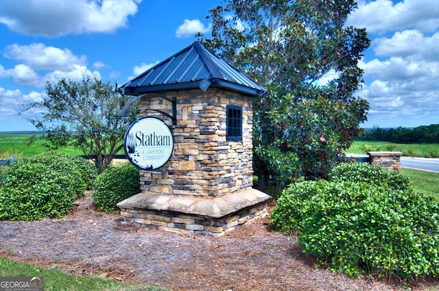 view of community sign