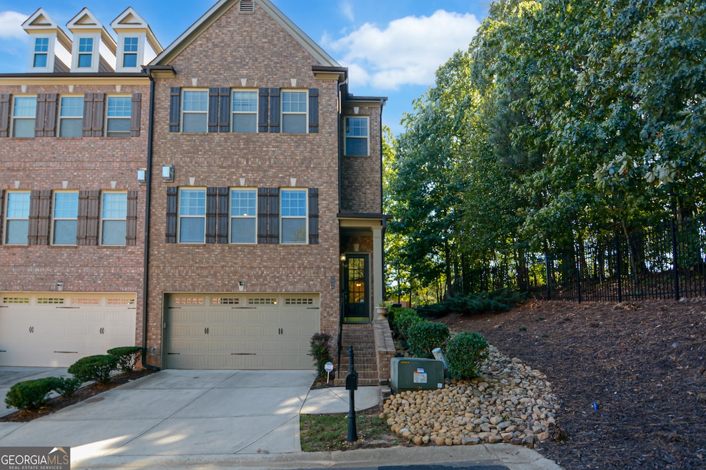 view of property featuring a garage