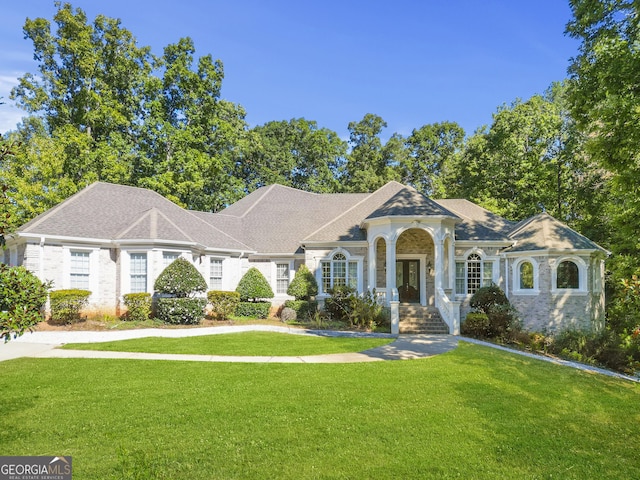 1565 Mountain Shadow Trl, Stone Mountain, GA 30087 - view of front of property with french doors and a front yard