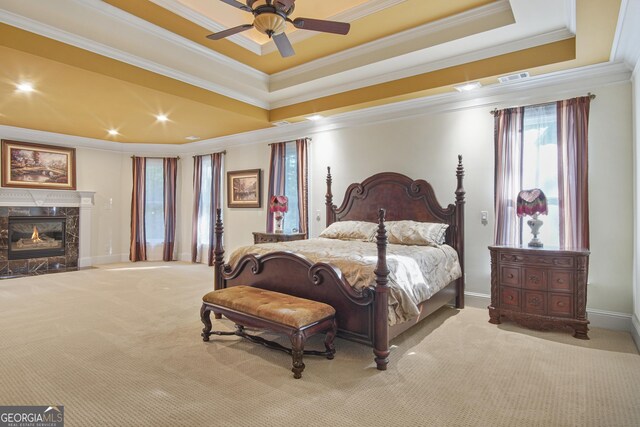 1565 Mountain Shadow Trl, Stone Mountain, GA 30087 - carpeted bedroom with a high end fireplace, a raised ceiling, baseboards, ornamental molding, and recessed lighting