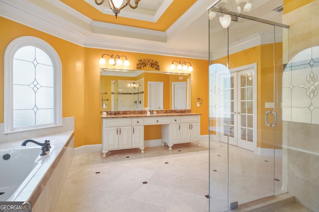 bathroom featuring vanity, shower with separate bathtub, ornamental molding, and a healthy amount of sunlight