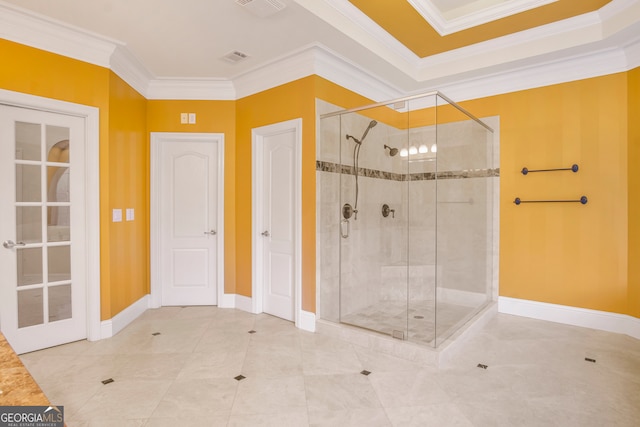 bathroom featuring crown molding, tile patterned flooring, and walk in shower