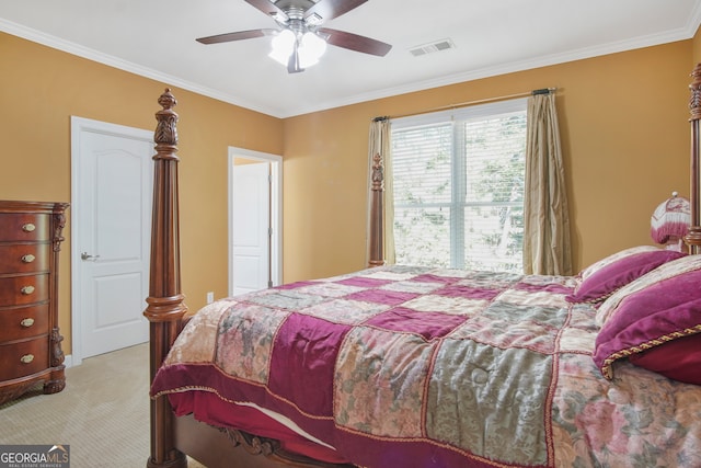 bedroom with light carpet, crown molding, and ceiling fan