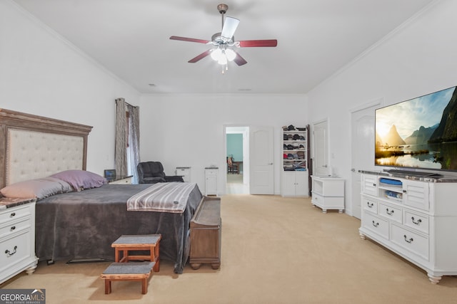 bedroom featuring light carpet, crown molding, and ceiling fan