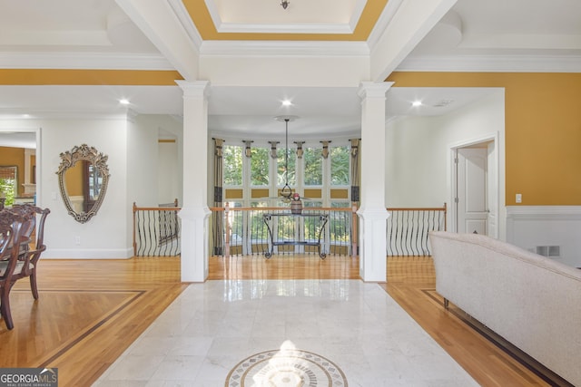 1565 Mountain Shadow Trl, Stone Mountain, GA 30087 - foyer entrance with crown molding, decorative columns, visible vents, and a tray ceiling