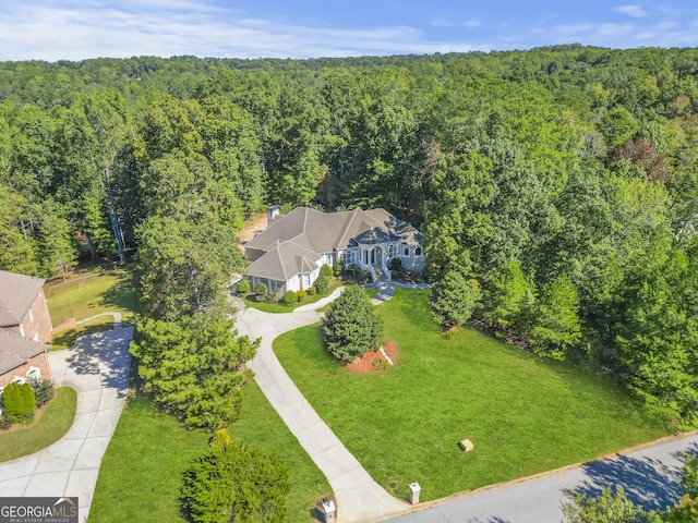 1565 Mountain Shadow Trl, Stone Mountain, GA 30087 - birds eye view of property featuring a wooded view