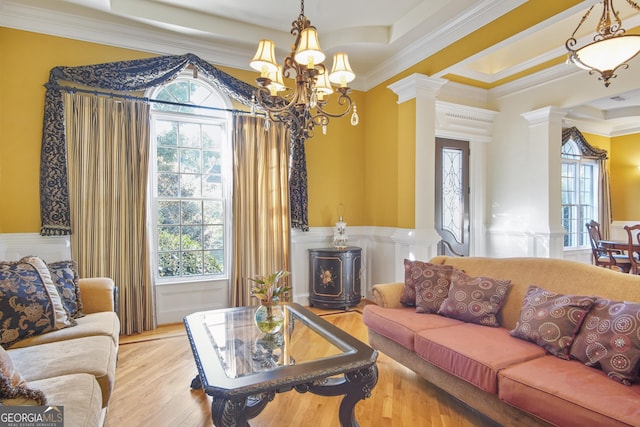 1565 Mountain Shadow Trl, Stone Mountain, GA 30087 - living room with wood finished floors, ornamental molding, a notable chandelier, and ornate columns