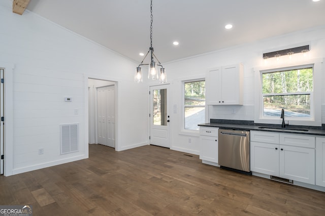 kitchen featuring lofted ceiling, sink, dark hardwood / wood-style flooring, white cabinetry, and dishwasher